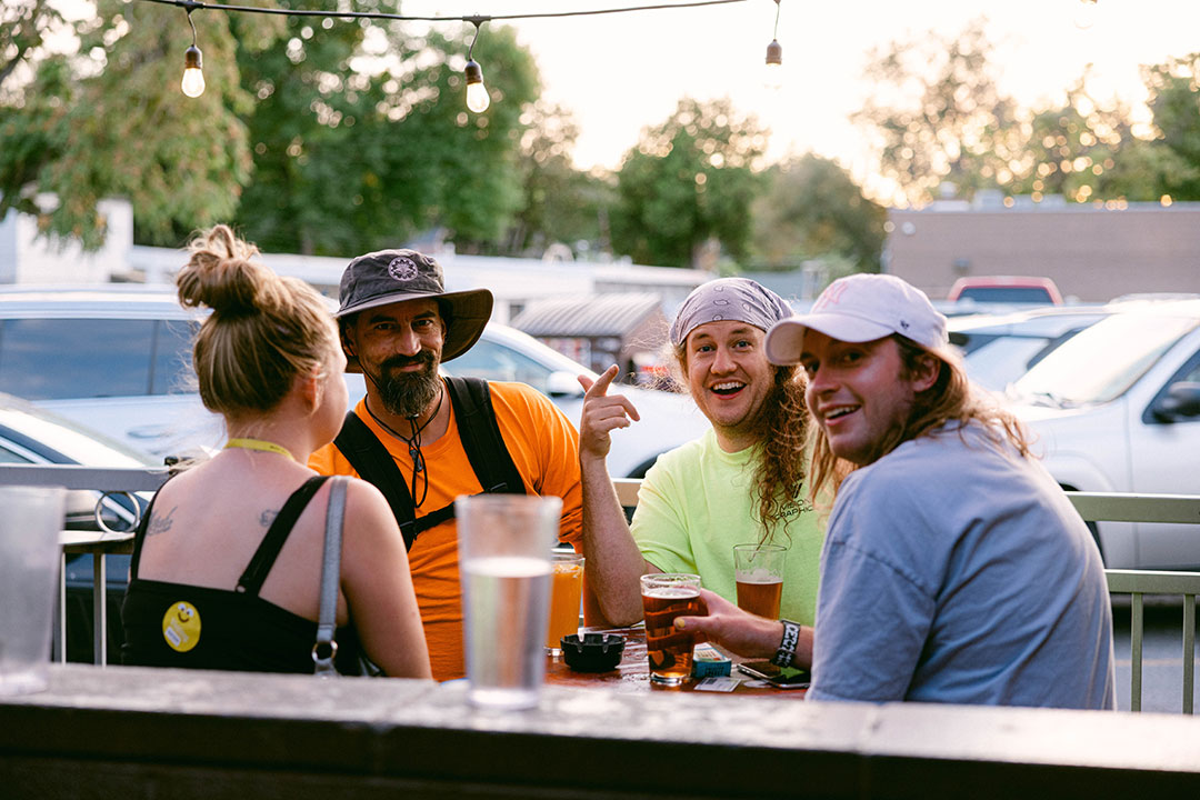 friends enjoying patio at Willie's Lounge